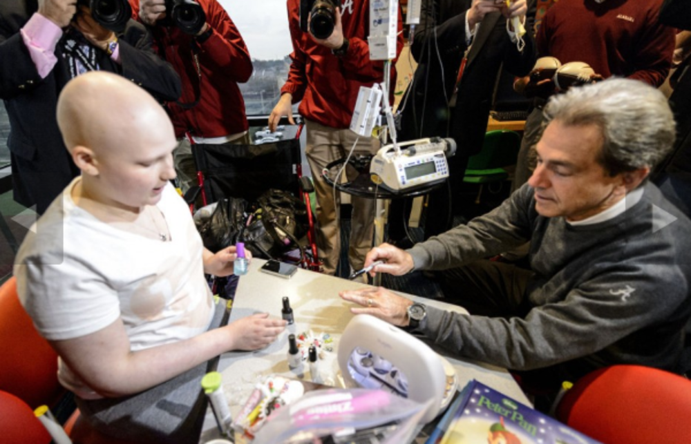 Nick Saban Gets Nails Painted by 12 Year Old Gabrielle Nave at Children's Hospital