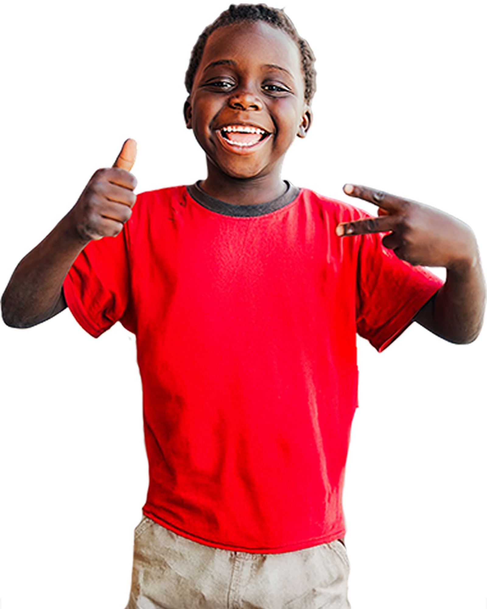 Excited young boy in a red shirt giving two thumbs up, smiling broadly