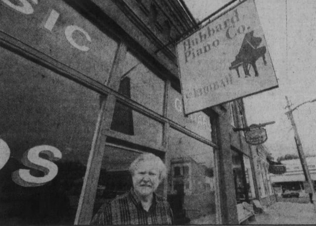 Charles Hubbard standing outside of the Hubbard Piano Company, 2008