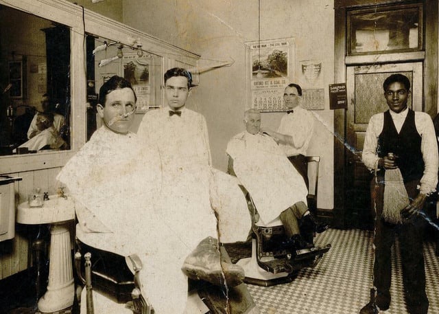 a barbershop at the rear of the post office