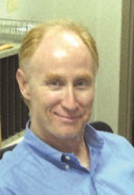 Russell A. Scholl, M.D.