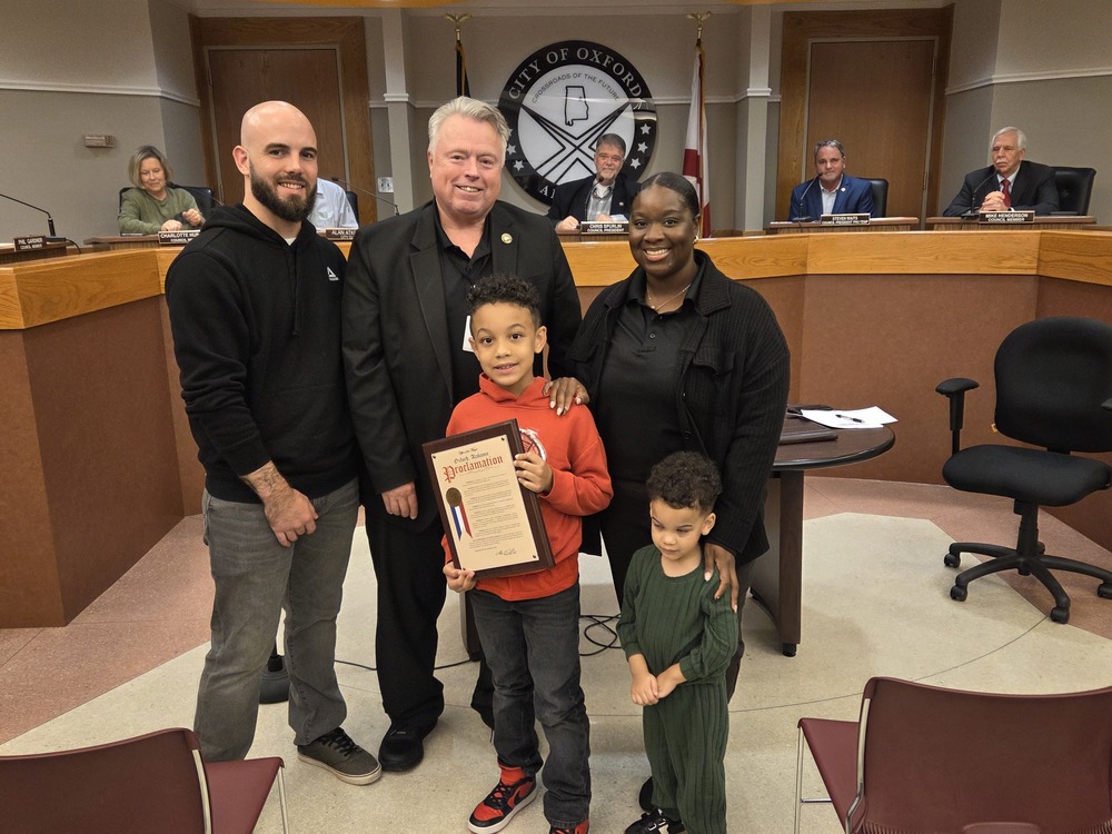 Mayor, council honors young hero; changes November meeting date